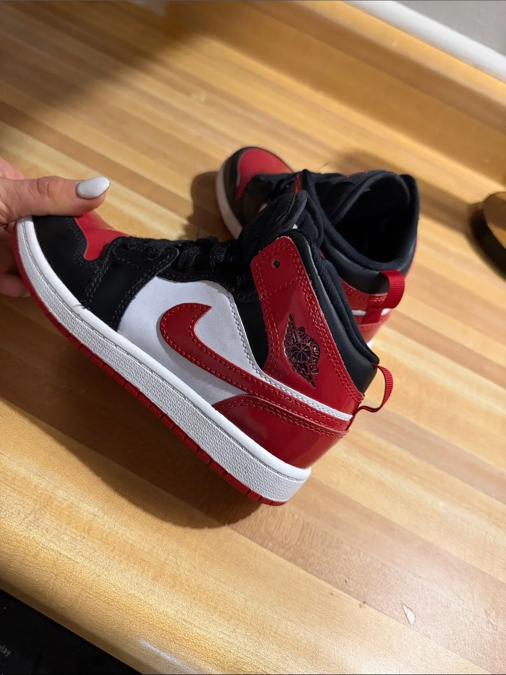 Jordan Kids Mid-Top Sneakers in Black, Red, and White